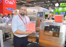 Christian Parra from Paclife in Peru showcasing their packaging machine.